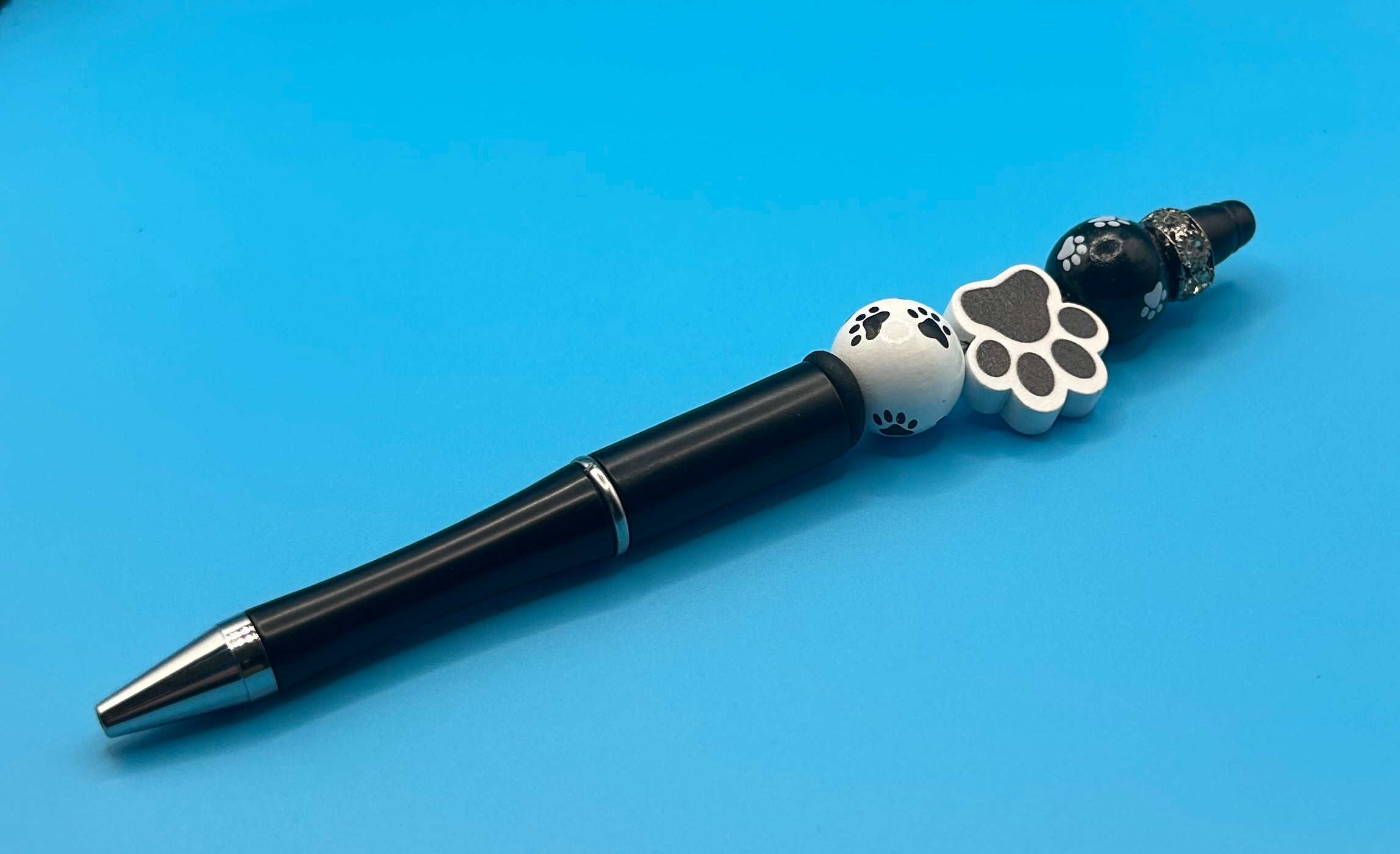 Black Pawprint Pebs (set of 2)